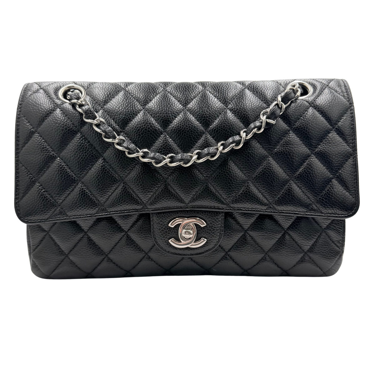 Chanel Medium Classic Flap in black quilted caviar leather, front view with silver-tone CC turn-lock and leather-interwoven chain