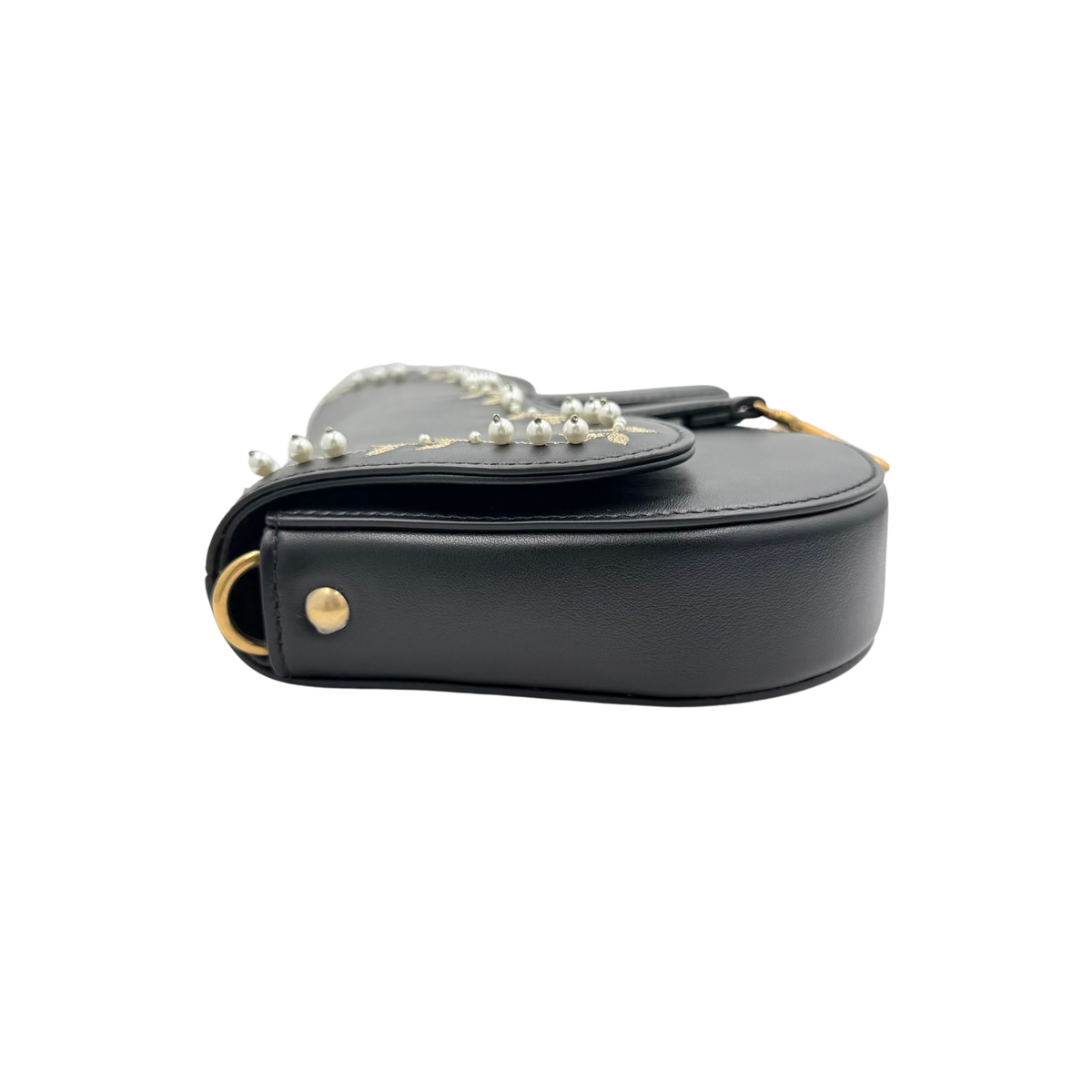 Christian Dior black leather Saddle bag, side and base profile showing pearl-trimmed flap