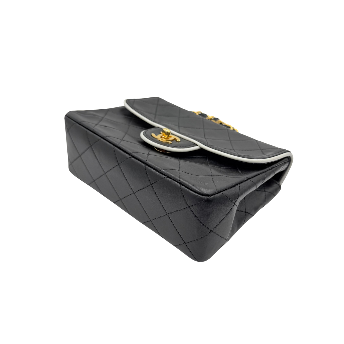 Chanel black quilted lambskin mini flap, opposite angled base and corner view