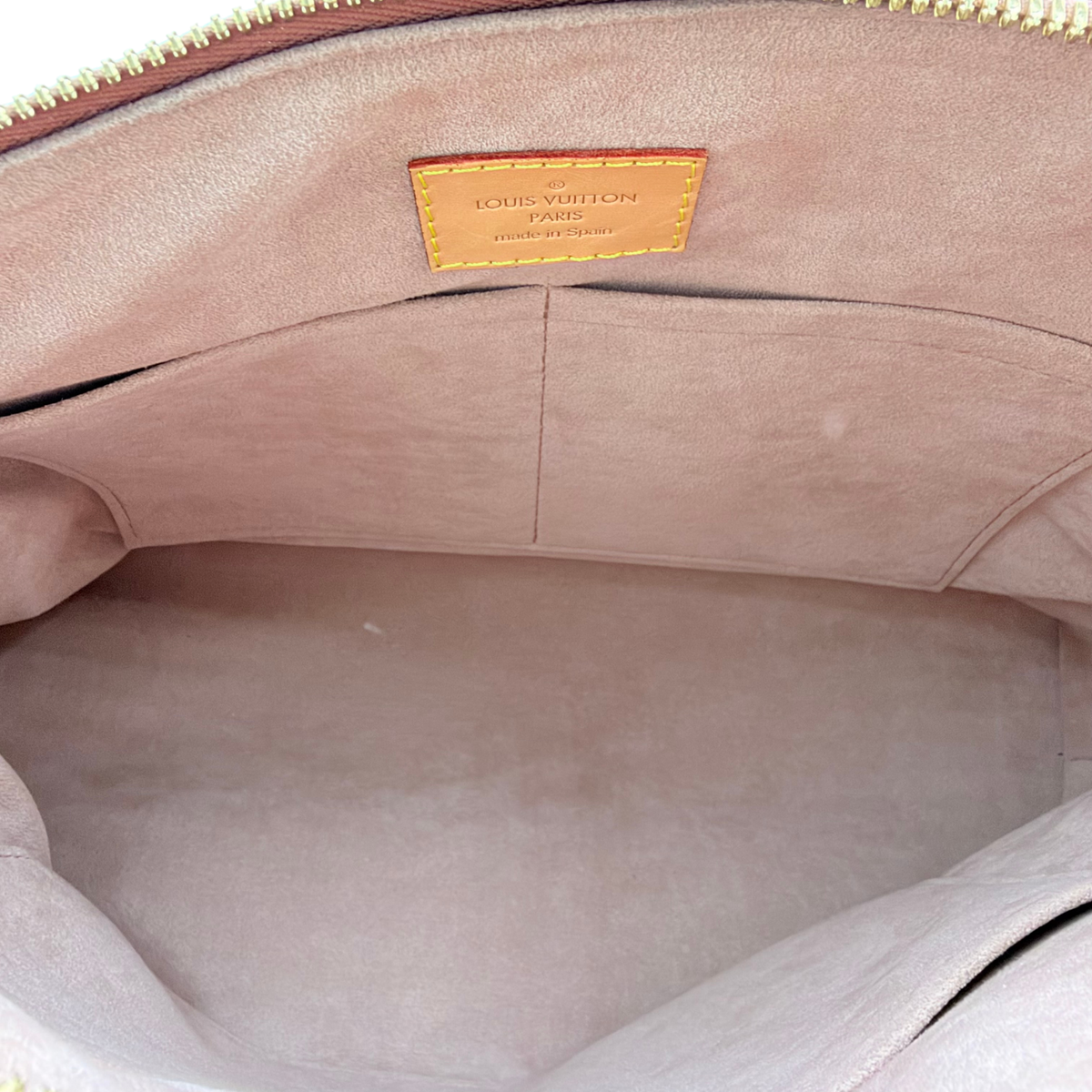 Louis Vuitton Pallas MM light pink-toned interior with slip pockets and Made in Spain label